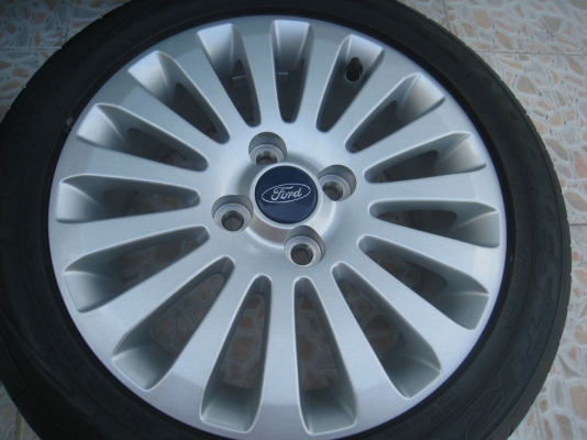ขายล้อแม็กเดิม ford fiesta 15"x6"  4/100 et45 +ยางปี09(081-3747940)