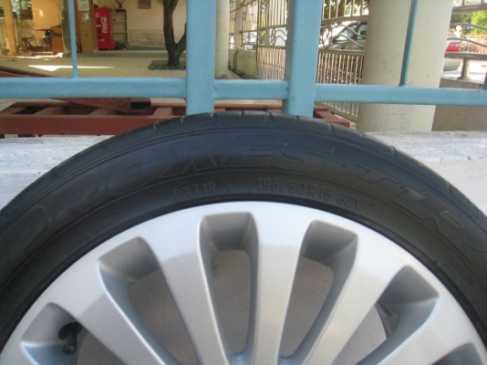 ขายล้อแม็กเดิม ford fiesta 15"x6"  4/100 et45 +ยางปี09(081-3747940)