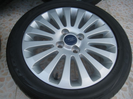ขายล้อแม็กเดิม ford fiesta 15"x6"  4/100 et45 +ยางปี09(081-3747940)