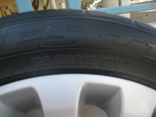 ขายล้อแม็กเดิม ford fiesta 15"x6"  4/100 et45 +ยางปี09(081-3747940)