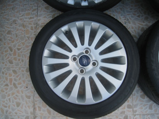 ขายล้อแม็กเดิม ford fiesta 15"x6"  4/100 et45 +ยางปี09(081-3747940)