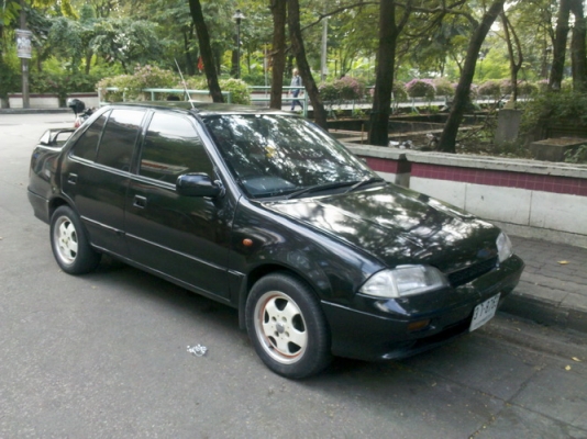 SUZUKI SWIFT สีดำสภาพดี ไม่จุกจิก วิ่งได้ทั้งแก็สและน้ำมัน ราคา52,000บาท