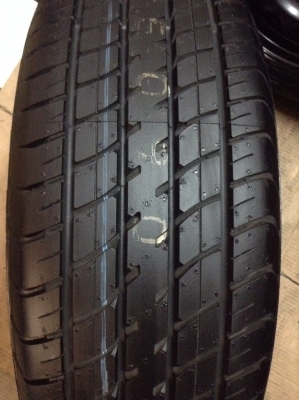 ขายยางป้ายแดง พร้อมล้อกะทะฝาครอบ 185 60 15 ปี13 ถูกๆ