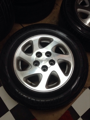 ขายแม็กพร้อมยางคัมรี่ตัวเก่าถูกๆ ยางบริสโตนปี11