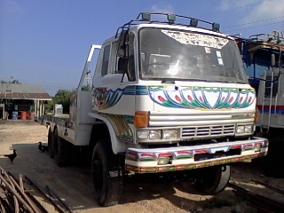 รถเทรนเลอร์   265  แรง   ขึ้นแมคโค  200   หางไอดีม  เหล็กหน้า  8   หน้า   6