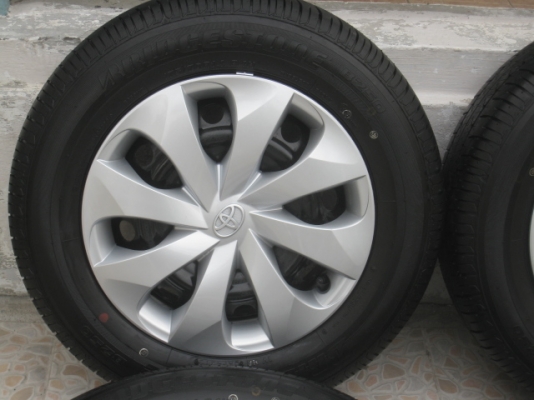 ขายล้อกะทะป้ายแดง nissan almera 14" 4 รู 100 ยาง ปี13 สนใจติดต่อเล็กคลองสามครับ (081-3747940)
