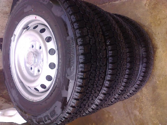 ล้อกระทะ16พร้อมยาง205R16บิดโตนดูเลอร์689ป้ายแดง