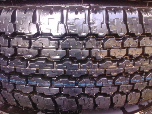 ล้อกระทะ16พร้อมยาง205R16บิดโตนดูเลอร์689ป้ายแดง