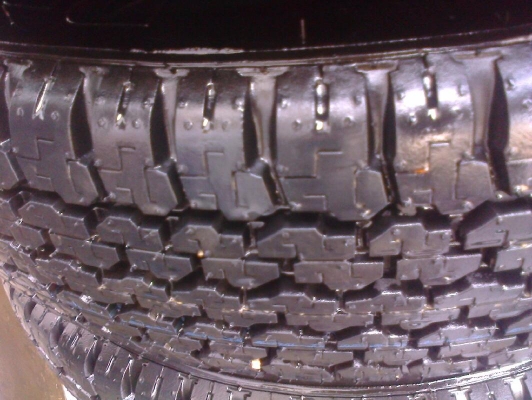 ล้อกระทะ16พร้อมยาง205R16บิดโตนดูเลอร์689ป้ายแดง