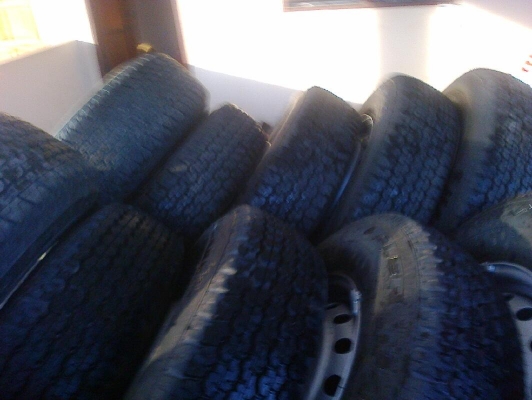 ล้อกระทะ16พร้อมยาง205R16บิดโตนดูเลอร์689ป้ายแดง