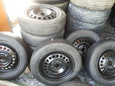 ขายล้อกะทะ15 4รู100 พร้อมยาง 1 ชุด