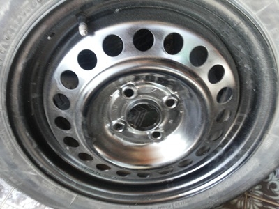 ขายล้อกะทะ15 4รู100 พร้อมยาง 1 ชุด