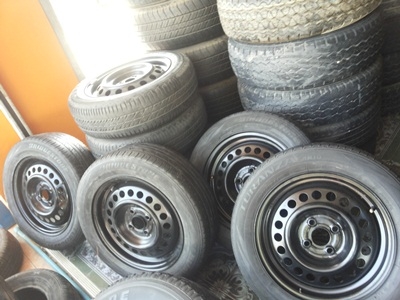 ขายล้อกะทะ15 4รู100 พร้อมยาง 1 ชุด