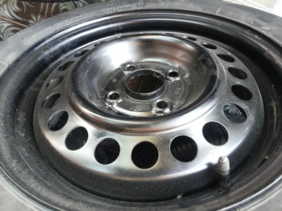 ขายล้อกะทะ15 4รู100 พร้อมยาง 1 ชุด