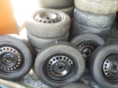 ขายล้อกะทะ15 4รู100 พร้อมยาง 1 ชุด