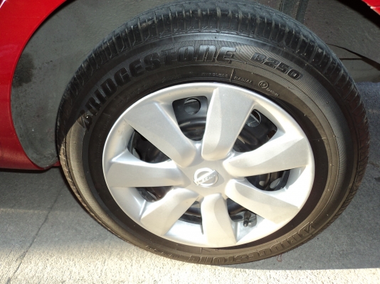 ขายกระทะพร้อมยางขอบ14  ยางติดรถป้ายแดงครับ