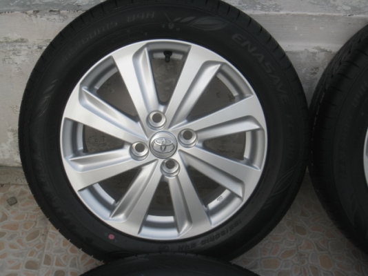 ขายล้อแม็กป้ายแดง New yaris 15"x5.5" et45 4รู100 +ยางยางผลิตสัปดาห์ที่50 ปี13  สนใจติดต่อเล็กคลองสามครับ (081-3747940)