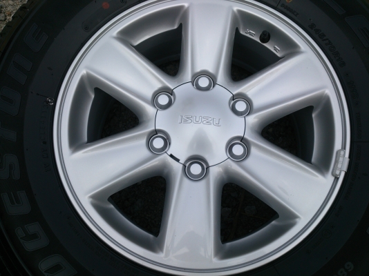 ขายแม็ก ALL NEW ISUZU ถอดป้ายแดงพร้อมยางบริสโตน 245/70R16 ยางสัปดาห์ที่41 ปี13 (ตุ่มหน้ายางยังมีอยู่) จำนวน 1 ชุด