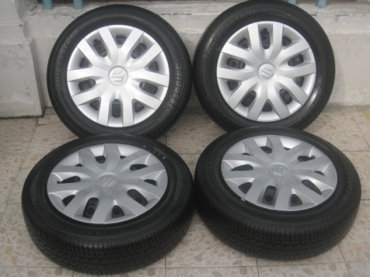 ขายกะทะล้อป้ายแดง suzuki swift ขอบ15 4รู100 +ยางปี13 สนใจติดต่อเล็กคลองสามครับ (081-3747940)