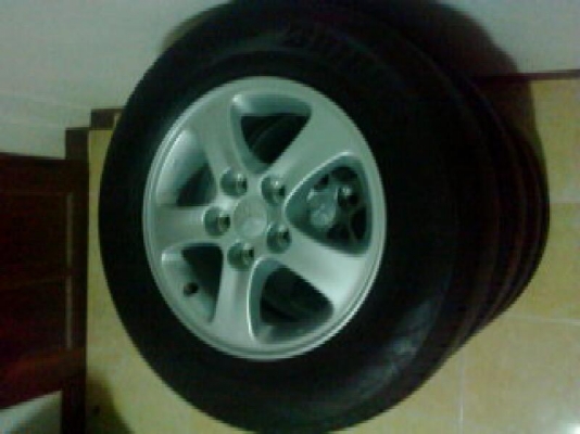 ไททัล15ป้ายแดงพร้อมยางบิดโตน20570R15ดูราวิดปี12 ไททัล15ป้ายแดงพร้อมยางบิดโตน20570R15ดูราวิดปี12