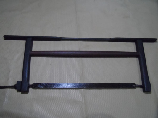 เลื่อย อก หรือ เลื่อย ยอก โบราณ ครับ