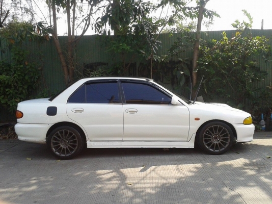 MITSUBISHI LANCER  ปี 94 สึขาว