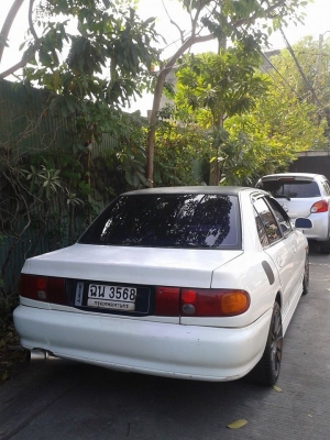 MITSUBISHI LANCER  ปี 94 สึขาว