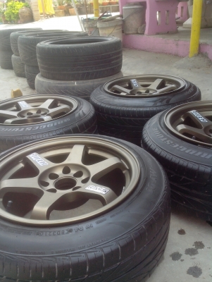 ขายte37 ขอบ15 4/100/114.3น8ล9 พร้อมยางบริสโตน 185/55/15 ปี10 90\%