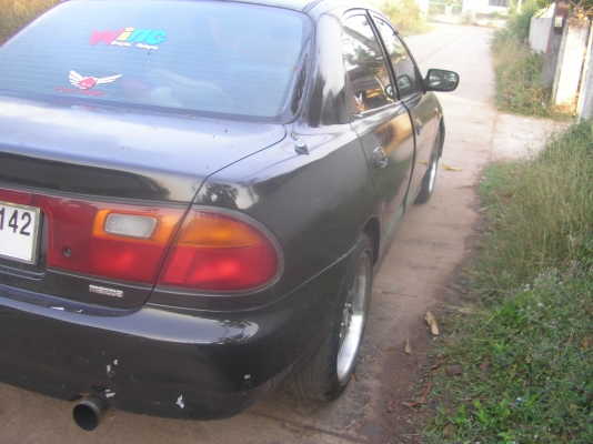 มาสด้า323ซีดาน ปี38 เกียร์ออโต้ ติดแก็ช แอร์เย็น ภาษีไม่ขาด ดิสเบรก4 ล้อ กระจกไฟฟ้า เช็ลทรันล็อก