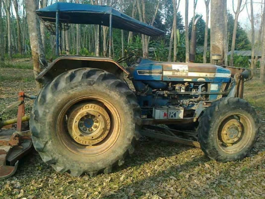 ขายรถไถฟอร์ด 6610 2 เพลา เอกสารเล่มทะเบียน 3 จาน 7 จาน ใบมีดดันหน้า ราคา 520000