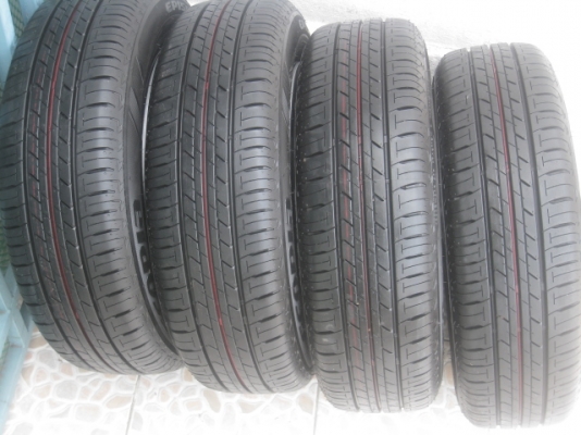 ขายกะทะล้อป้ายแดง new yaris ขอบ14 4รู100 ยางปี13 สนใจติดต่อเล็กคลองสามครับ (081-3747940)