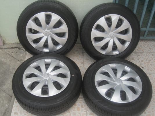 ขายกะทะล้อป้ายแดง new yaris ขอบ14 4รู100 ยางปี13 สนใจติดต่อเล็กคลองสามครับ (081-3747940)