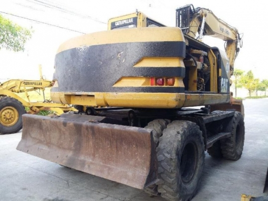 รถขุดล้อยาง CAT M312 # 6TL00484 สนใจโทร 083 081 2889