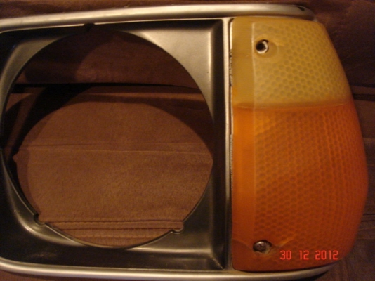 กรอบไฟหน้า Mazda323(ตูดแตงโม) กรอบไฟหน้า Mazda323(ตูดแตงโม)