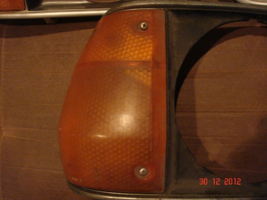 กรอบไฟหน้า Mazda323(ตูดแตงโม) กรอบไฟหน้า Mazda323(ตูดแตงโม)