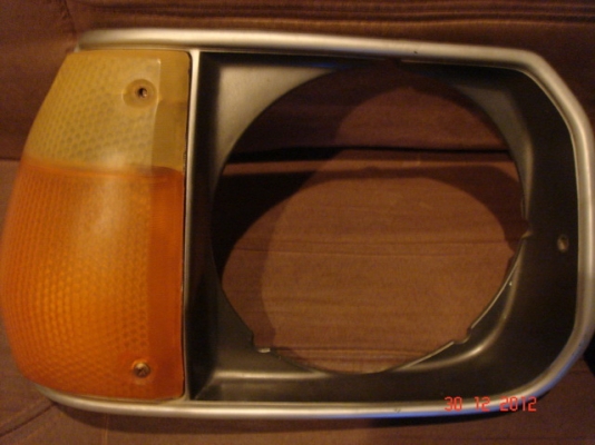 กรอบไฟหน้า Mazda323(ตูดแตงโม) กรอบไฟหน้า Mazda323(ตูดแตงโม)