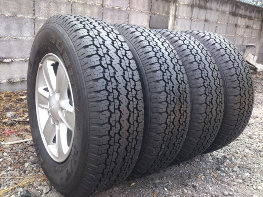 ขายแม๊ก ALL NEW ISUZU ถอดป้ายแดงพร้อมยาง บริสโตน 245/70R16 ยางสัปดาห์ที่31 ปี13 เส้นสีตุ่มหน้ายางอยู่ครบทุกเส้น (สภาพใหม่มาก) จำนวน 1 ชุด