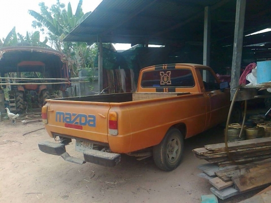 รถกระบะมาสด้าแฟมิเลียสีส้มเครื่องเบนซิลติดแก็สแล้ว รถพร้อมใช้เอกสารทะเบียนพร้อม