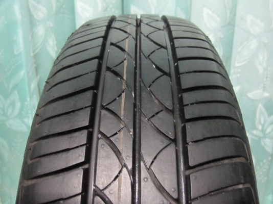 ขายล้อกะทะพร้อมยางป้ายแดง Nissan March ขอบ 14 ตุ่มหน้ายางมี