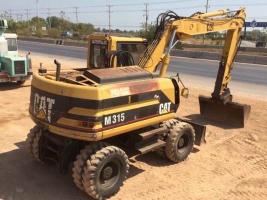ขายรถแบคโฮ ล้อยาง CAT M315 ระบบไฟฟ้าเต็ม รถนอกนำเข้าสภาพสวยมากๆเดิมๆ มีVDOการทำงานครับ