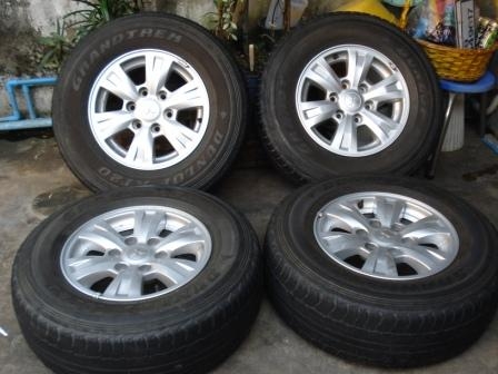 ขายล้อแม็กไทรทัน ขอบ 16 พร้อมยาง 245-70-16 ปี 12