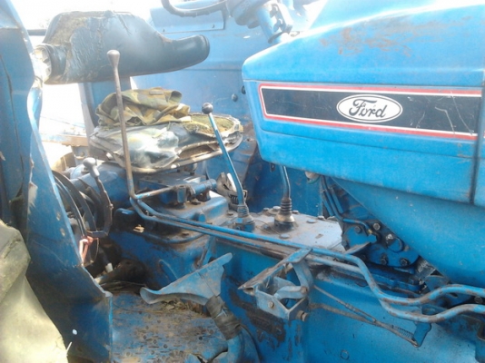 FORD 77 - 1 เพลา T5 เครื่องแรงดีไม่มีเยิ้ม อุปกรณ์ครบ มีใบดันหน้า ผานพรวนดิน 6 ผานพรวนดิน 3 ระบบไฮดรอลิกส์ไม่มีรั่วซึ่มพร้อมทำงาน เอกสารเล่มทะเบียนครบพร้อมโอนครับ