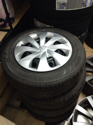 ขายล้อกะทะพร้อมยางป้ายแดงบริสโตน 175 65 14 ปี14