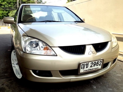 NEW LANCER 05 เกียร์ MT แท้ เบาะหนัง  แบตเตอรี่ใหม่ เซนเซอร์ถอยหลัง วิทยุซีดี สภาพสวย เล่มพร้อมโอนขนส่ง หรือ จัดไฟแนนท์ได้ครับ