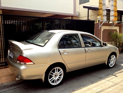 NEW LANCER 05 เกียร์ MT แท้ เบาะหนัง  แบตเตอรี่ใหม่ เซนเซอร์ถอยหลัง วิทยุซีดี สภาพสวย เล่มพร้อมโอนขนส่ง หรือ จัดไฟแนนท์ได้ครับ