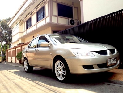 NEW LANCER 05 เกียร์ MT แท้ เบาะหนัง  แบตเตอรี่ใหม่ เซนเซอร์ถอยหลัง วิทยุซีดี สภาพสวย เล่มพร้อมโอนขนส่ง หรือ จัดไฟแนนท์ได้ครับ