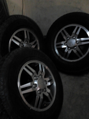 ขาย แม็ก HILANDER พร้อมยาง  BRIDGESTONE DUELER H/T ขาย 4 ล้อ  TEL..081-427-3941