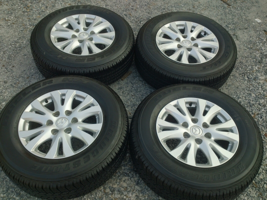 ขายแม็ก ALL NEW MAZDA พร้อมยางบริสโตน 265/65R17 ยางสัปดาห์ที่04 ปี13 ดอกยางสวยนิ่มลึกเท่ากันไม่ร้าวไม่แตกลายสภาพยาง 95\% จำนวน 1 ชุด