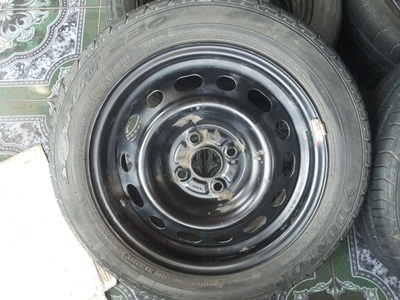 ขายล้อกะทะ15 4รู100 MAZDA พร้อมยาง 1 ชุด