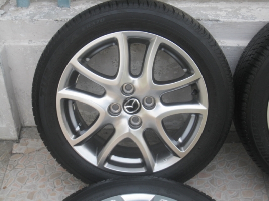 ขายล้อแม็ก mazda2 16"x6.5" et50 4 รู 100 สีไฮเปอร์แบล็ค ยาง bridgestone turanza er370 185/55r16 ยางผลิตสัปดาห์ที่ 6 ปี 13 vios, yaris, fiesta , swift ใส่ได้ครับ  สนใจติดต่อเล็กคลองสามครับ (081-3747940)
